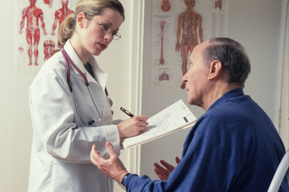 A man talking to a doctor