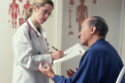 A man talking to a doctor