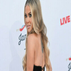 Carmen Electra reveals meaning behind back tattoo