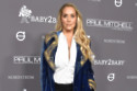 Elizabeth Berkley has revealed her fashion 'good luck charm'