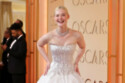 Elle Fanning sought Margaret Qualley's advice about wearing prosthetic breasts