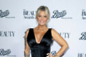 Kerry Katona's mother has been hospitalised with a back injury