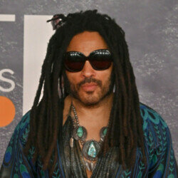 Lenny Kravitz had four of his trademark deadlocks ripped out of his head by a female fan in Brisbane, Australia
