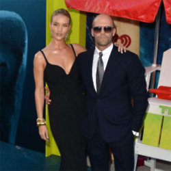 Rosie Huntington-Whiteley says Jason Statham is a huge help when she's working on her underwear brand