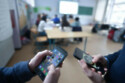 Students using smartphones in schools