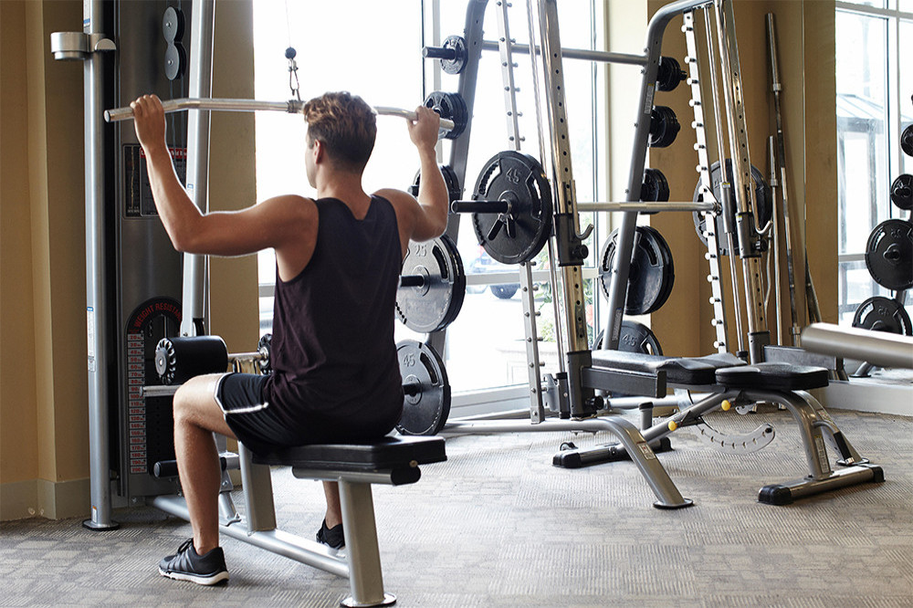 A man doing exercise at a gym