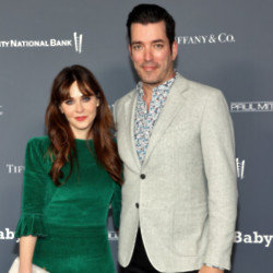 Zooey Deschanel and Jonathan Scott aren't in a hurry to tie the knot